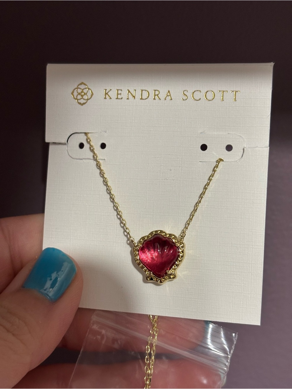 Kendra Scott Gold Necklace with Dark pink shell Pendant